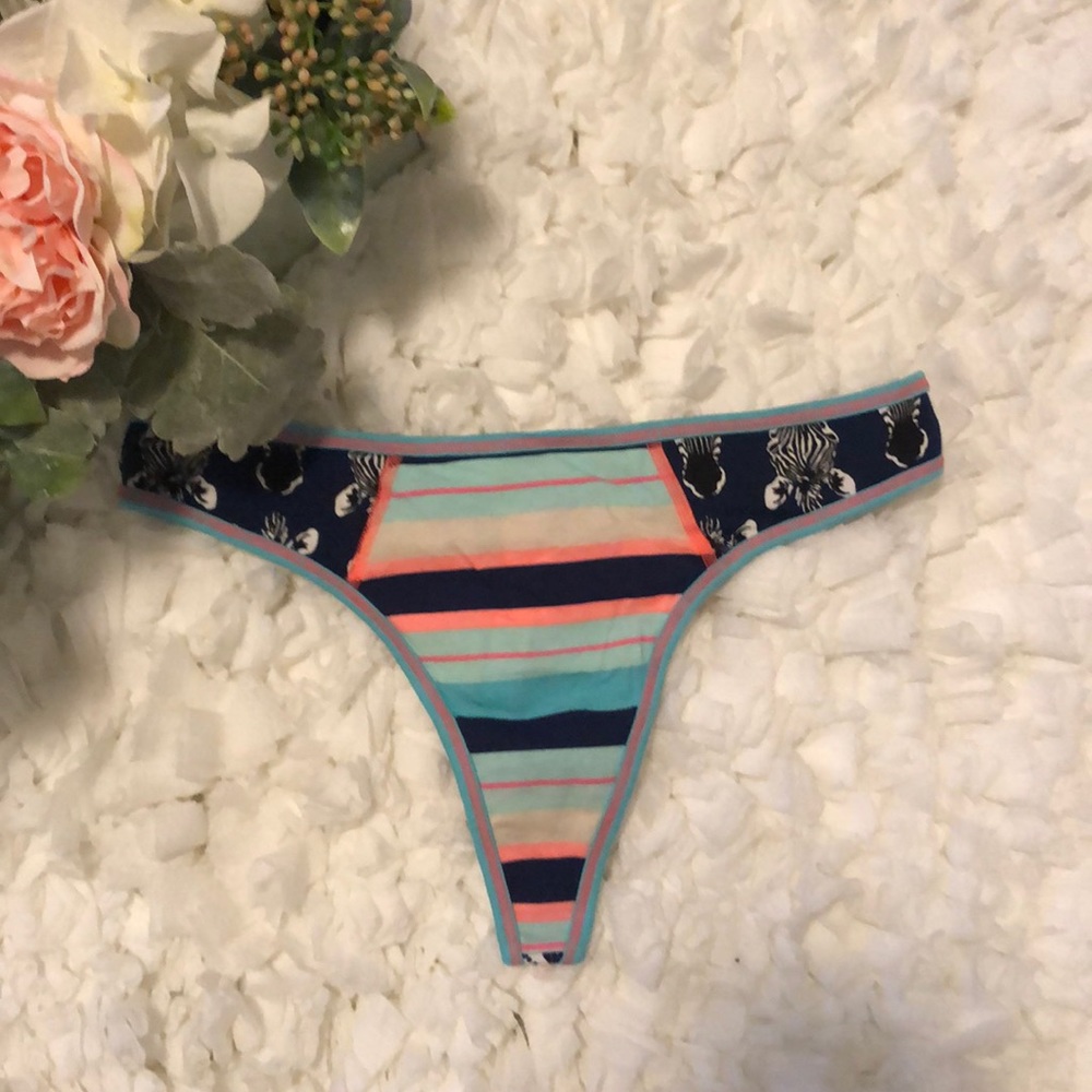 NWT.Victoria’s Secret stripes with zebra’s thong.